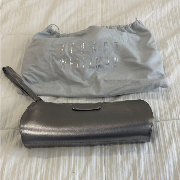 Stuart Weitzman Metallic Silver Leather Lace-Trim Wristlet Clutch